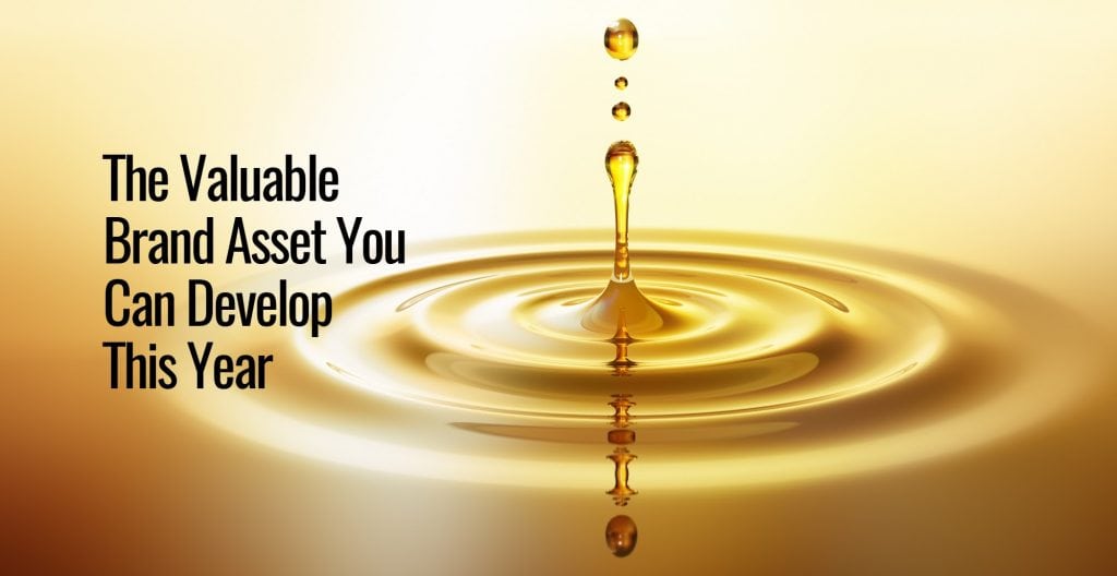 A close up photo of a water ripple that has a golden color effect