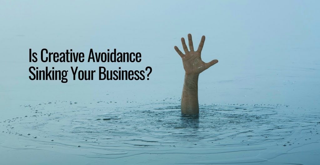 A sinking man with just his hand above water