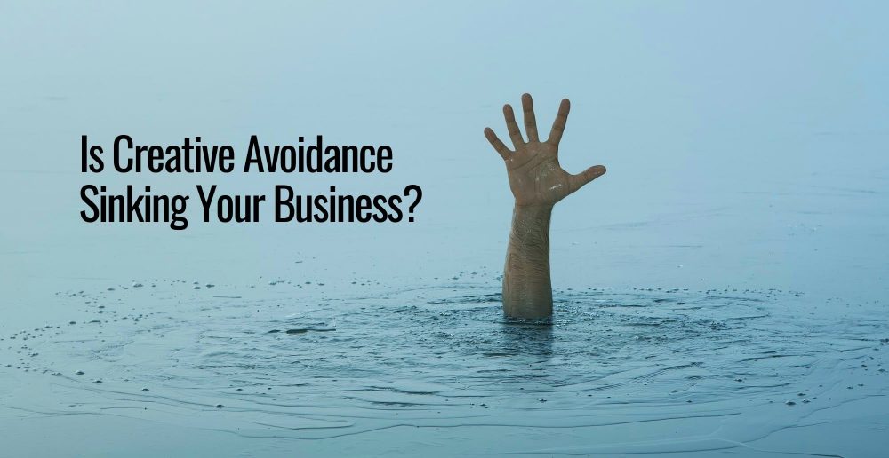 A sinking man with just his hand above water