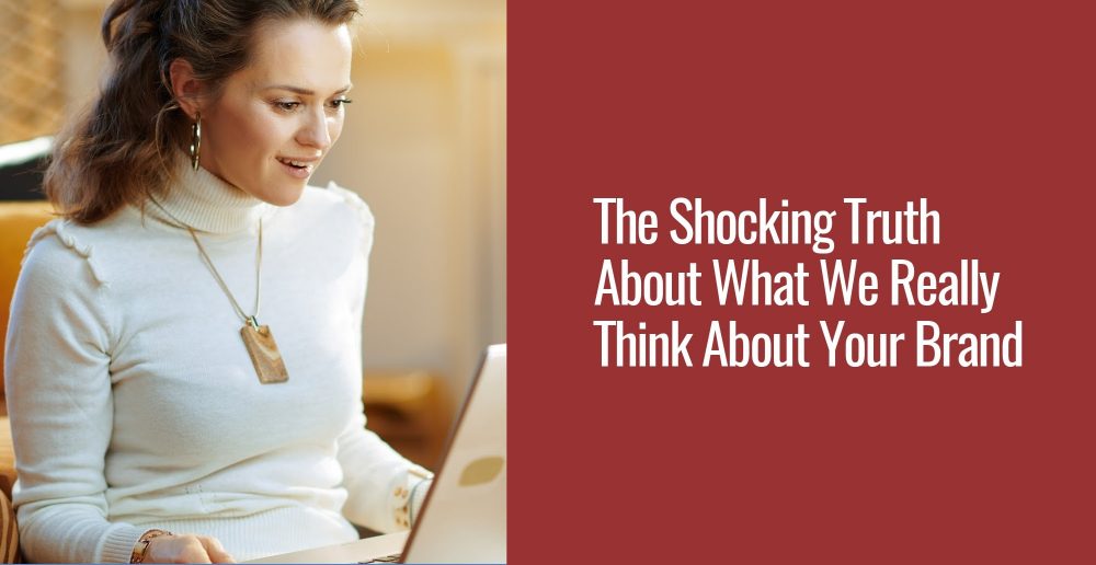 A woman who is looking at her laptop and is a bit surprised