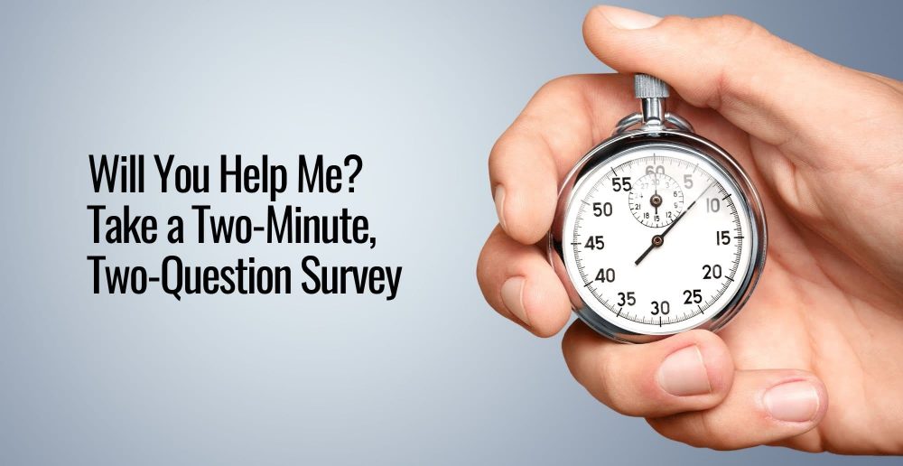 A right hand holding a stopwatch